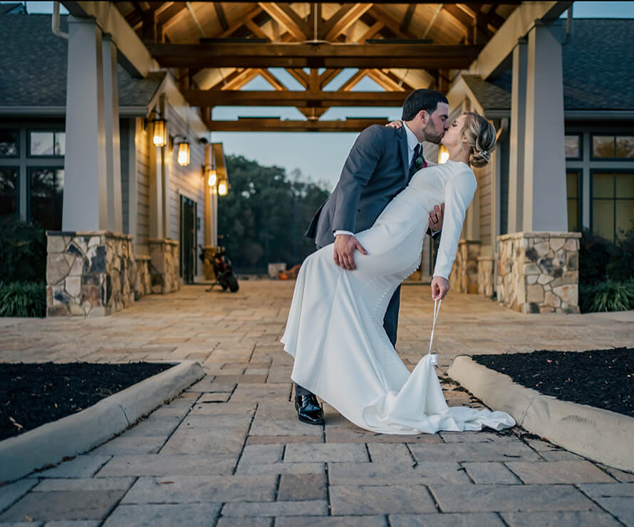 bride and groom kissing